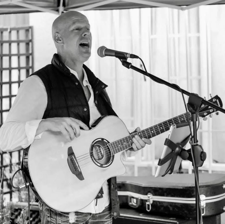 Bruce performing at an event